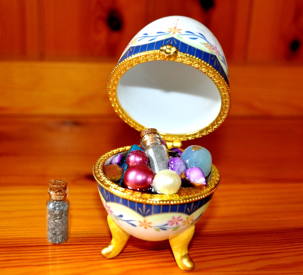 Fabergé Egg, a fusion of ash or hair, pearls, gems and jewels encased in epoxy resin